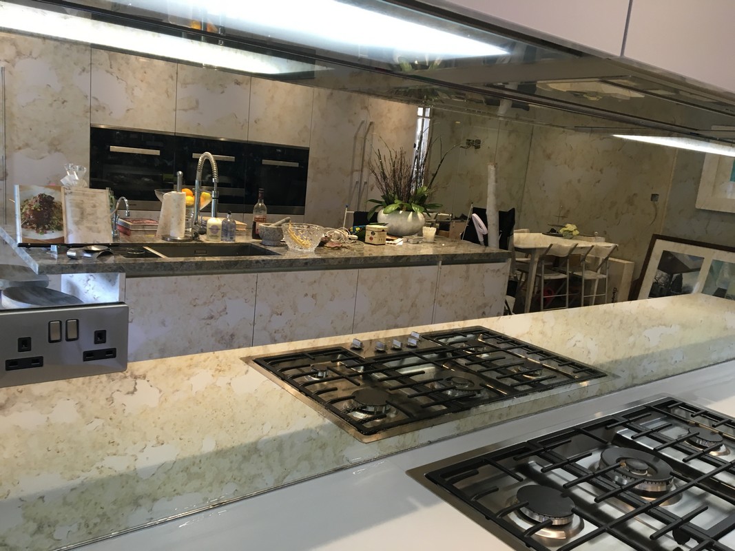 Mirror glass splashback in Highgate luxury kitchen
